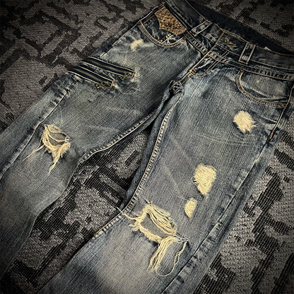 Semantic Design Snake Skin Distressed Flared Jeans