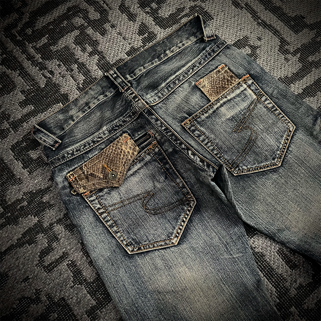 Semantic Design Snake Skin Distressed Flared Jeans