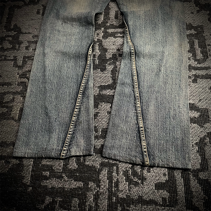 Semantic Design Snake Skin Distressed Flared Jeans