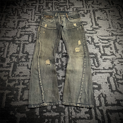Semantic Design Snake Skin Distressed Flared Jeans