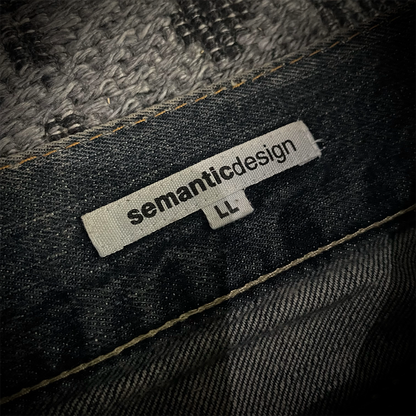 Semantic Design Snake Skin Distressed Flared Jeans