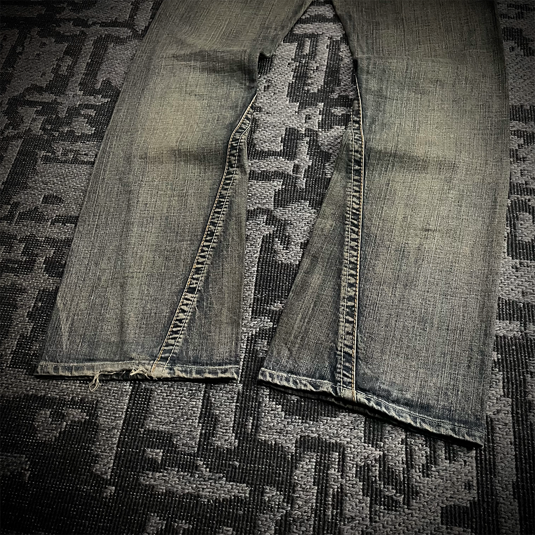 Semantic Design Snake Skin Distressed Flared Jeans