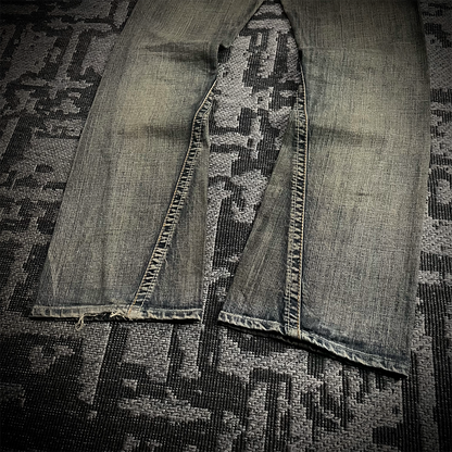 Semantic Design Snake Skin Distressed Flared Jeans