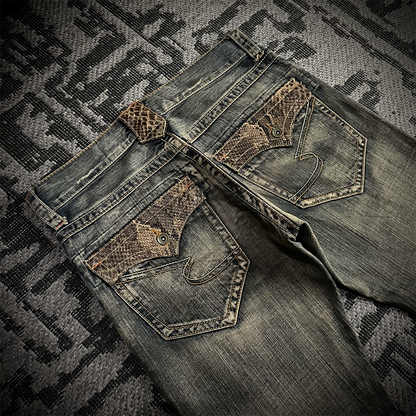 Semantic Design Snake Skin Distressed Flared Jeans