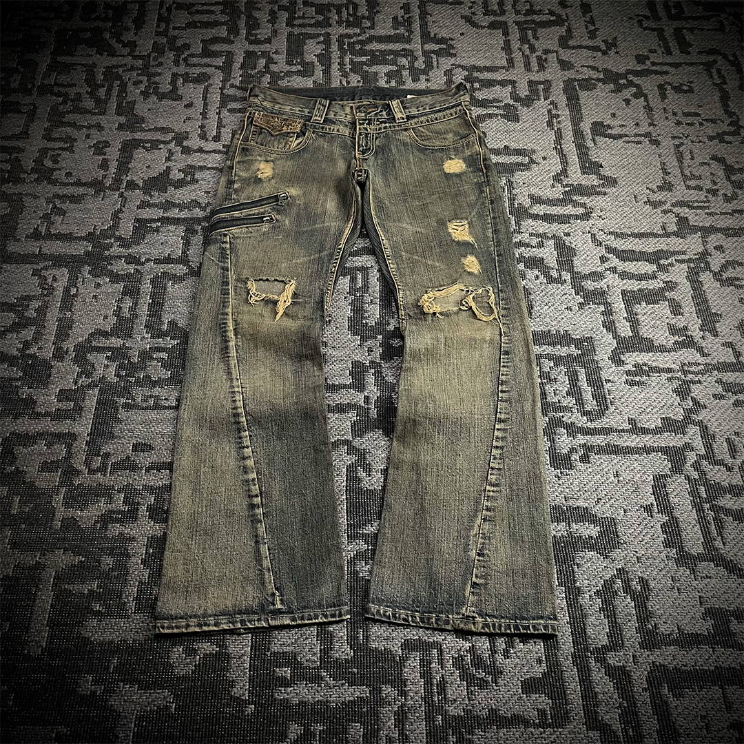 Semantic Design Snake Skin Distressed Flared Jeans