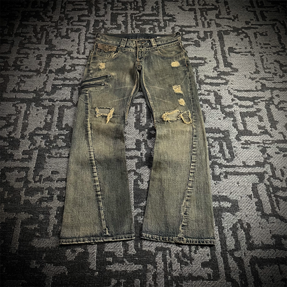 Semantic Design Snake Skin Distressed Flared Jeans