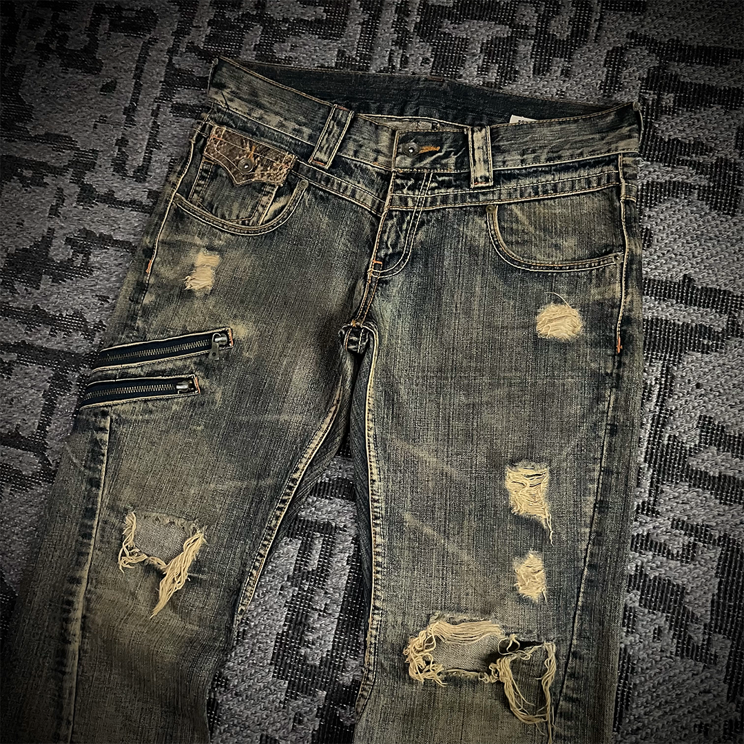 Semantic Design Snake Skin Distressed Flared Jeans