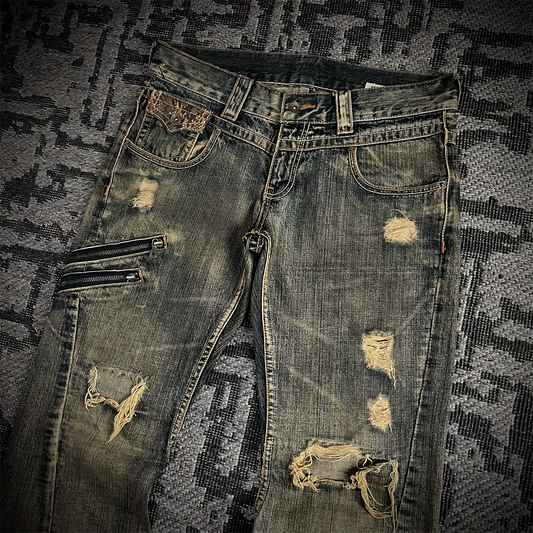 Semantic Design Snake Skin Distressed Flared Jeans