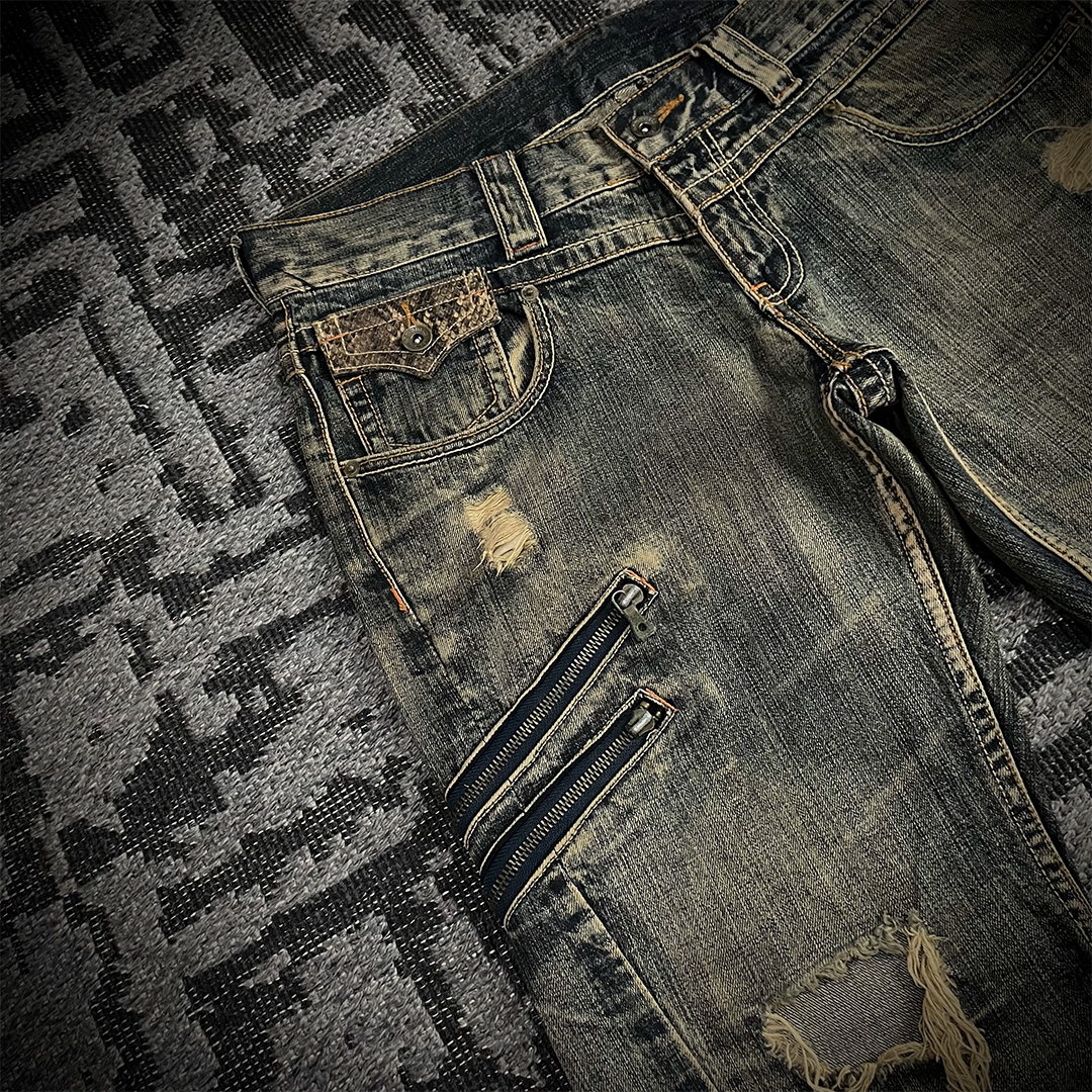 Semantic Design Snake Skin Distressed Flared Jeans