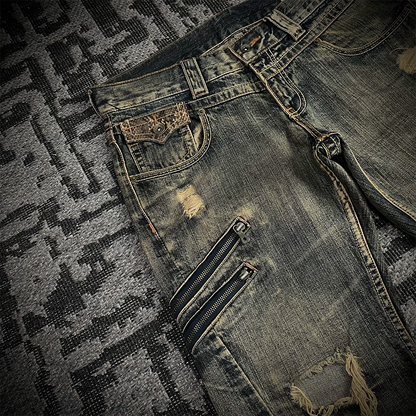 Semantic Design Snake Skin Distressed Flared Jeans