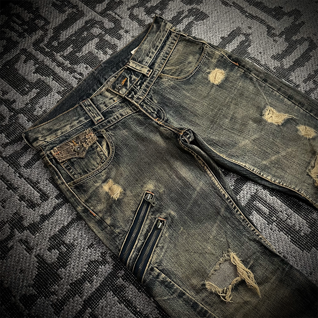 Semantic Design Snake Skin Distressed Flared Jeans