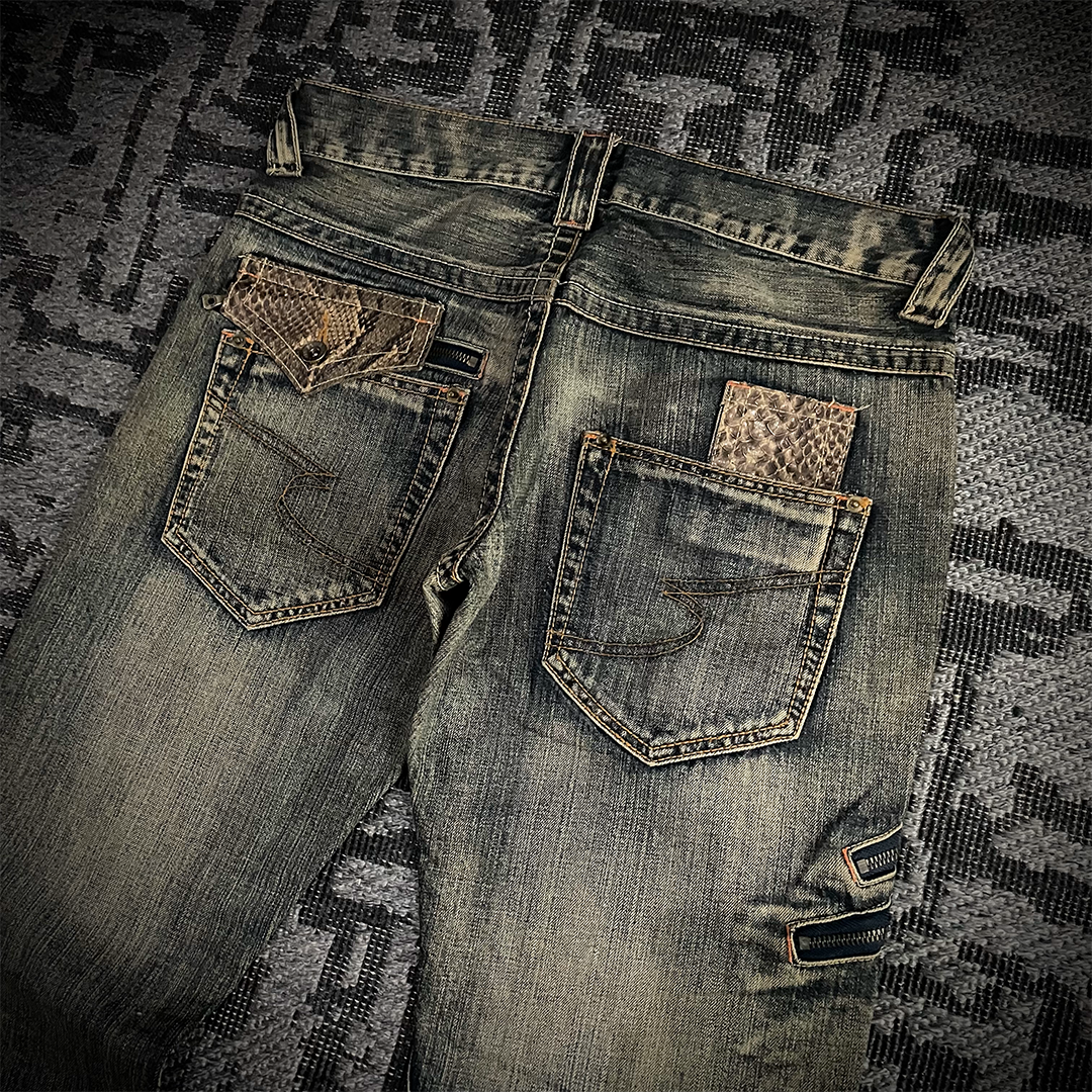 Semantic Design Snake Skin Distressed Flared Jeans