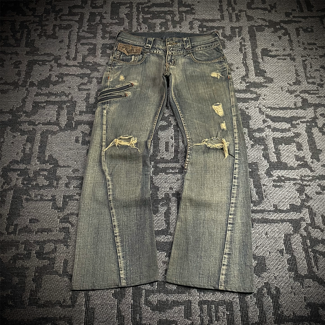 Semantic Design Snake Skin Distressed Flared Jeans