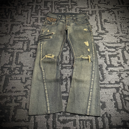 Semantic Design Snake Skin Distressed Flared Jeans