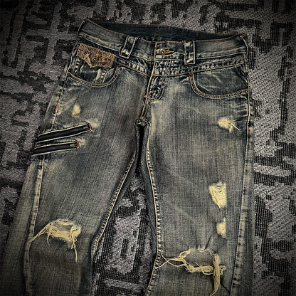 Semantic Design Snake Skin Distressed Flared Jeans