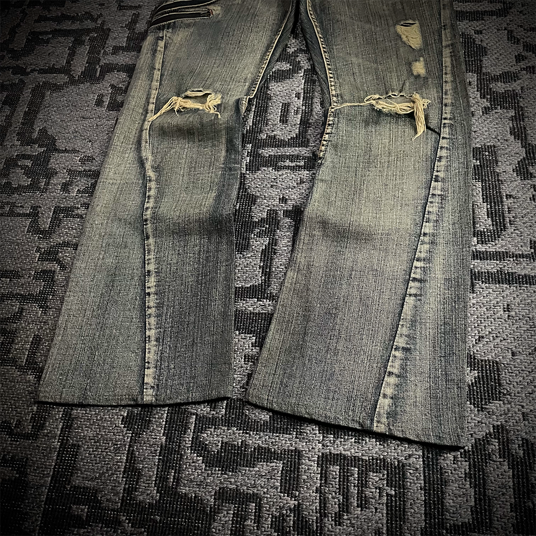 Semantic Design Snake Skin Distressed Flared Jeans