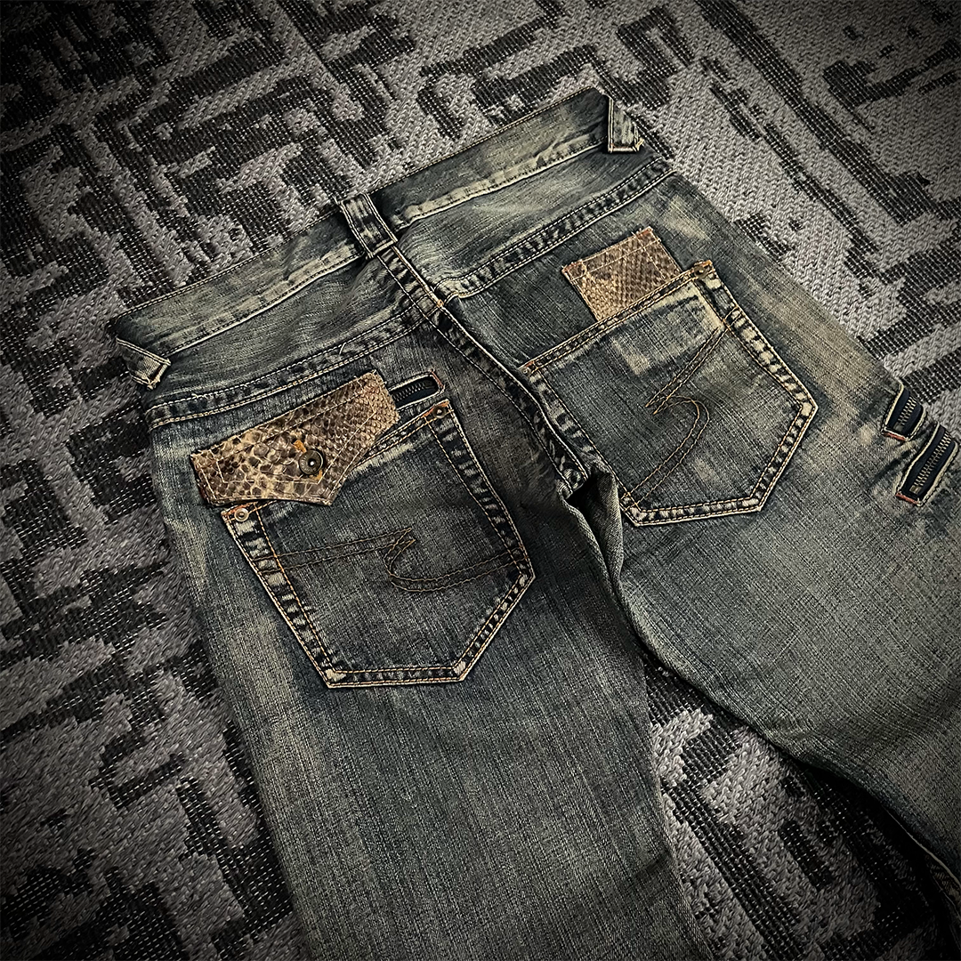 Semantic Design Snake Skin Distressed Flared Jeans