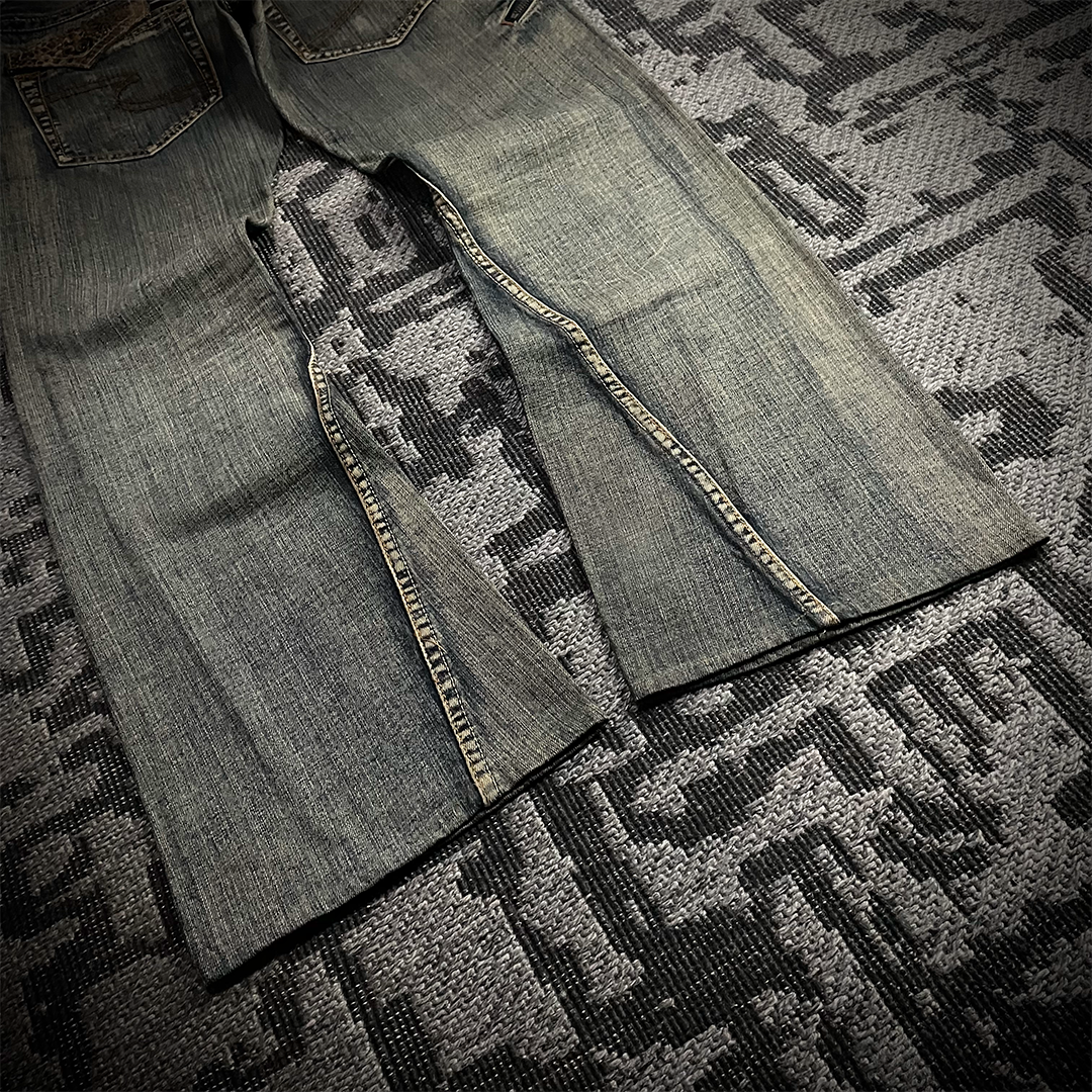 Semantic Design Snake Skin Distressed Flared Jeans