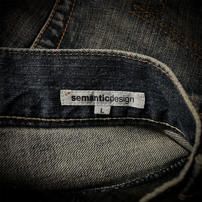 Semantic Design Snake Skin Distressed Flared Jeans