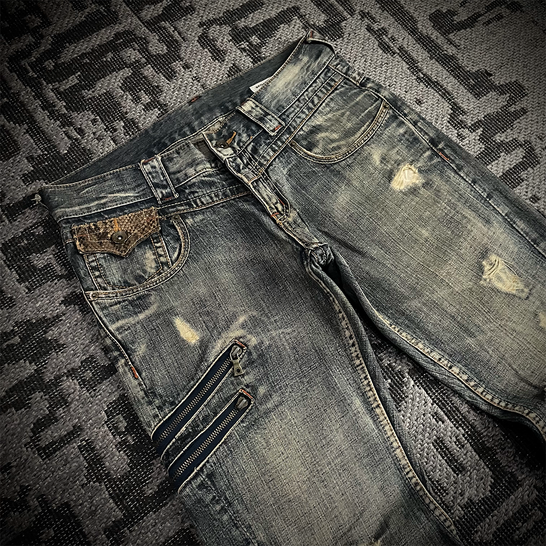 Semantic Design Snake Skin Distressed Flared Jeans