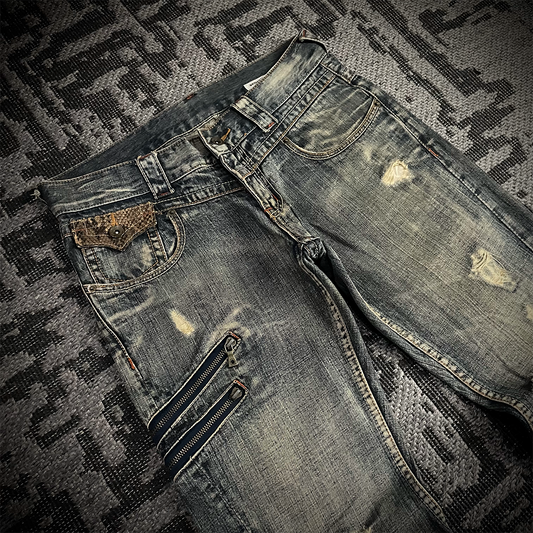 Semantic Design Snake Skin Distressed Flared Jeans