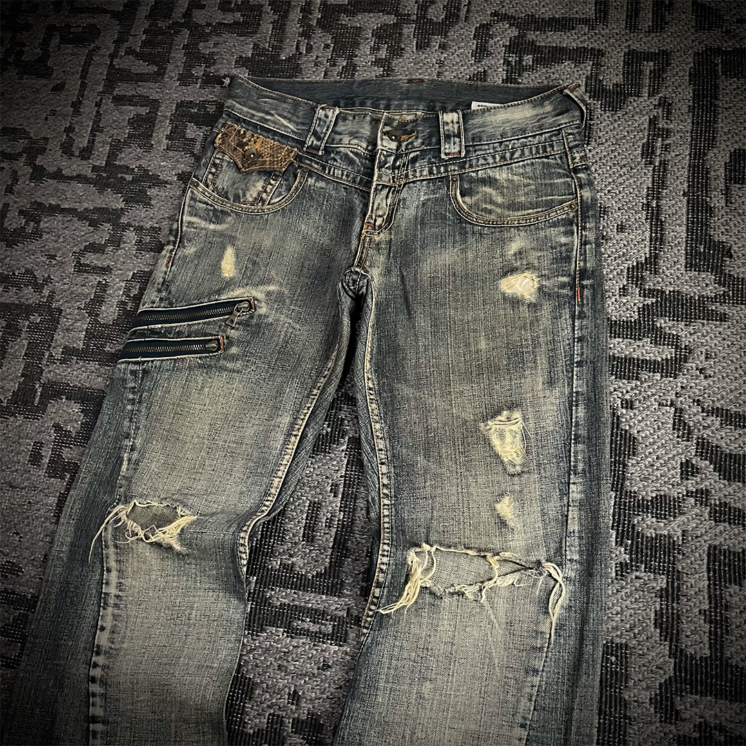 Semantic Design Snake Skin Distressed Flared Jeans