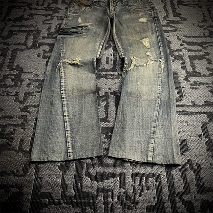 Semantic Design Snake Skin Distressed Flared Jeans