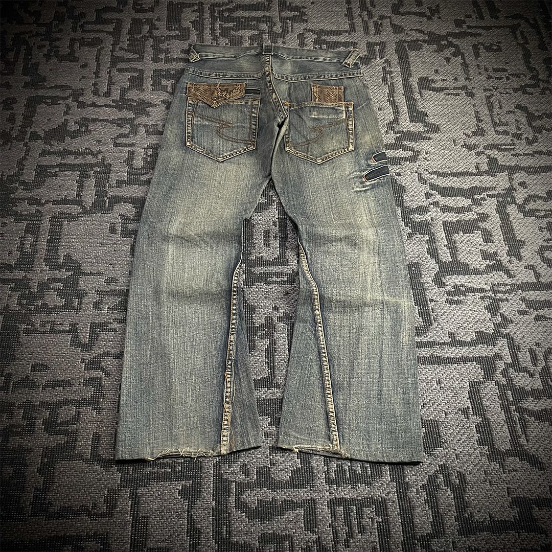 Semantic Design Snake Skin Distressed Flared Jeans