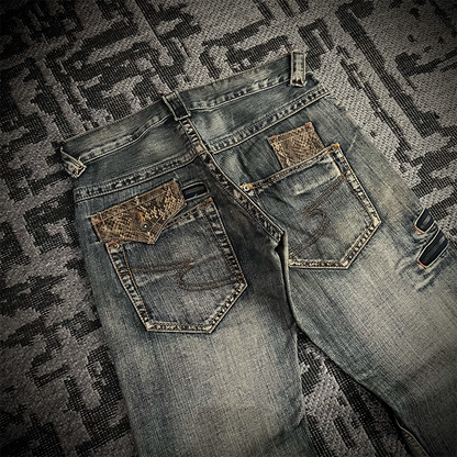 Semantic Design Snake Skin Distressed Flared Jeans