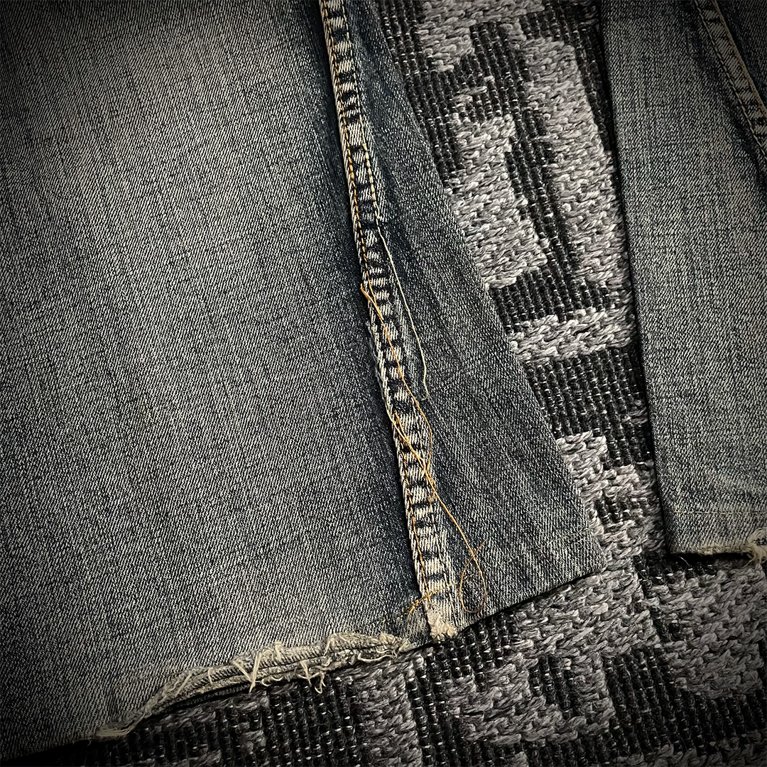 Semantic Design Snake Skin Distressed Flared Jeans