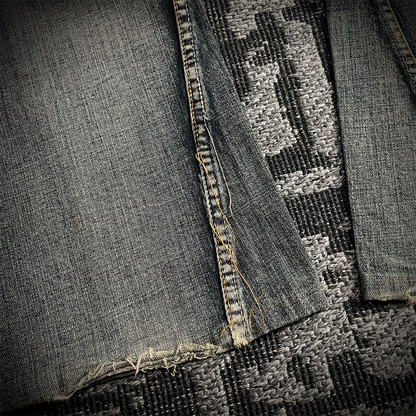 Semantic Design Snake Skin Distressed Flared Jeans